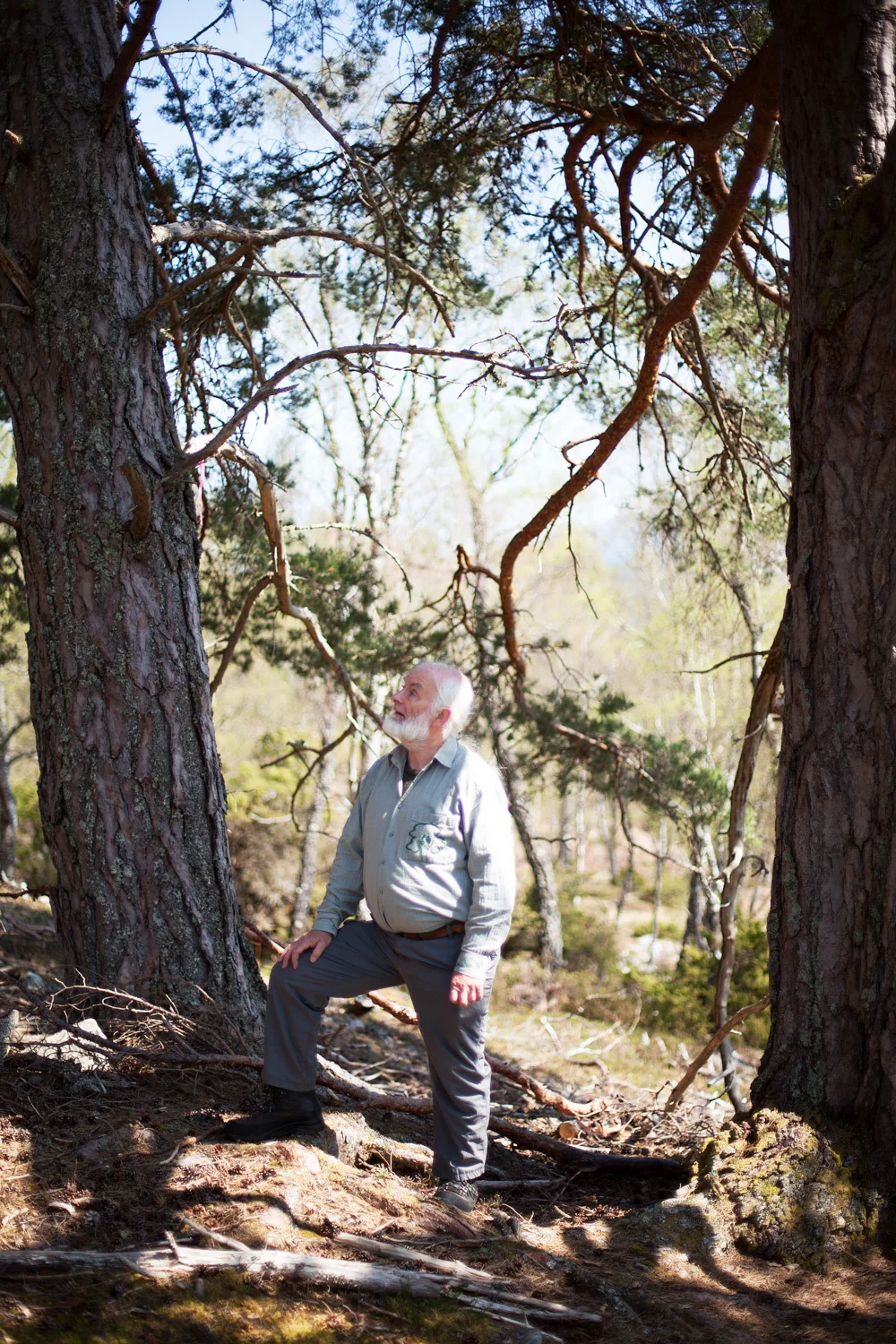Alan Watson Featherstone standing in the forest
